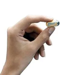 Hand holding capsule endoscopy pill camera